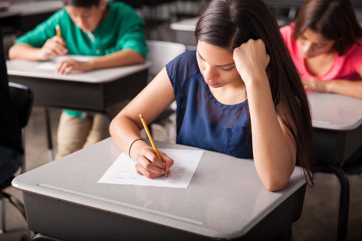 group-high-school-students-taking-test-classroom_662251-1868
